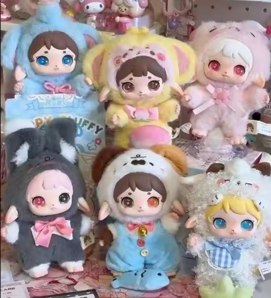RUBY HAPPY FLUFFY VINYL FACED PLUSHIE PENDANT
